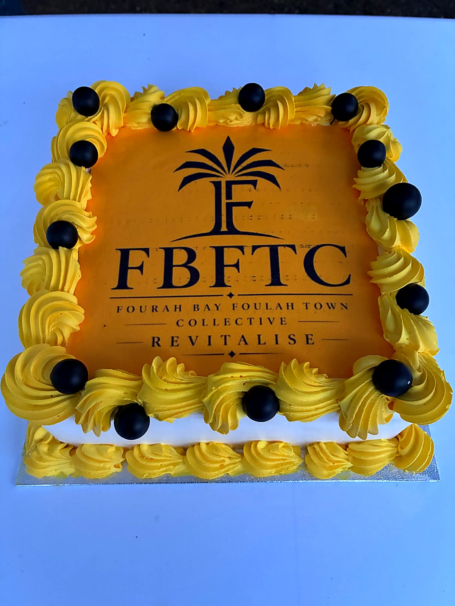 The celebration cake carrying the FBFTC crest