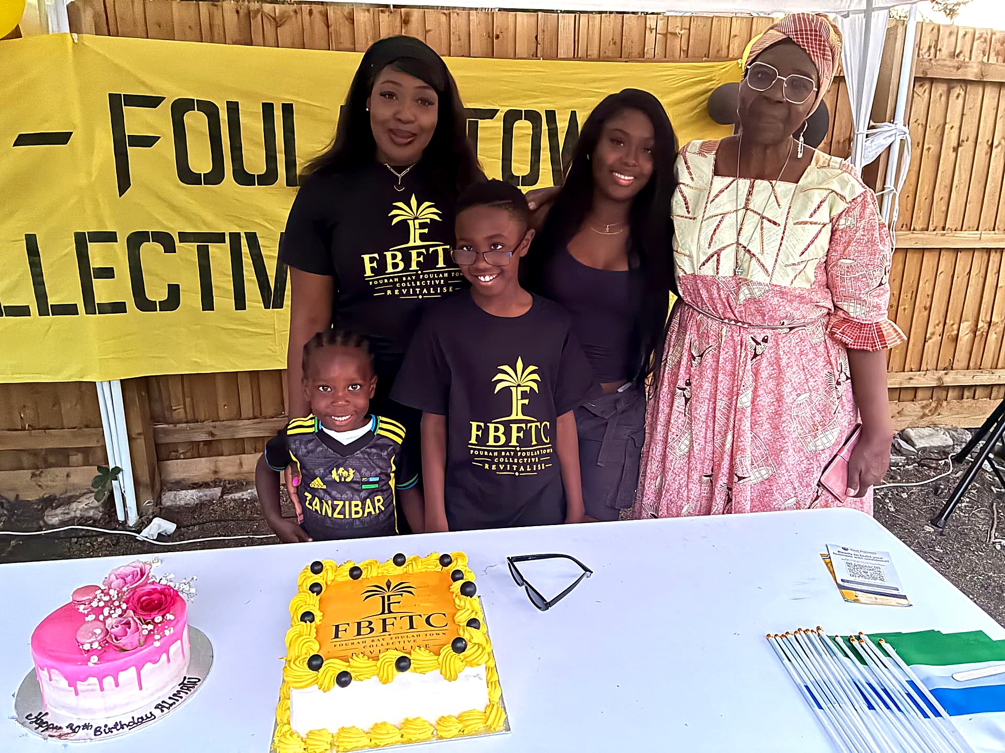 Four generations at the cake table